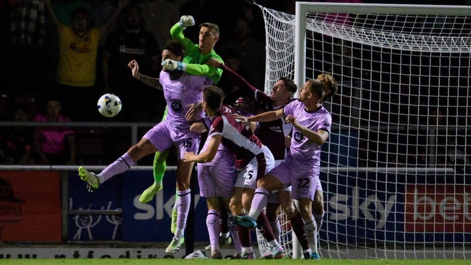 George Wickens of Lincoln City punches clear during the EFL Sky Bet League One match between Northampton Town and Lincoln City at Sixfields Stadium, Northampton.