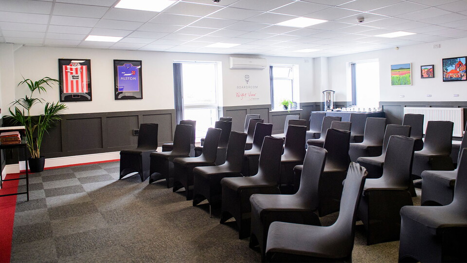 The Wright Vigar boardroom, with chairs laid out for a meeting
