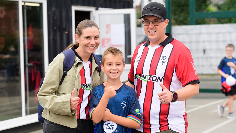 Supporters in the Fan Village on a matchday