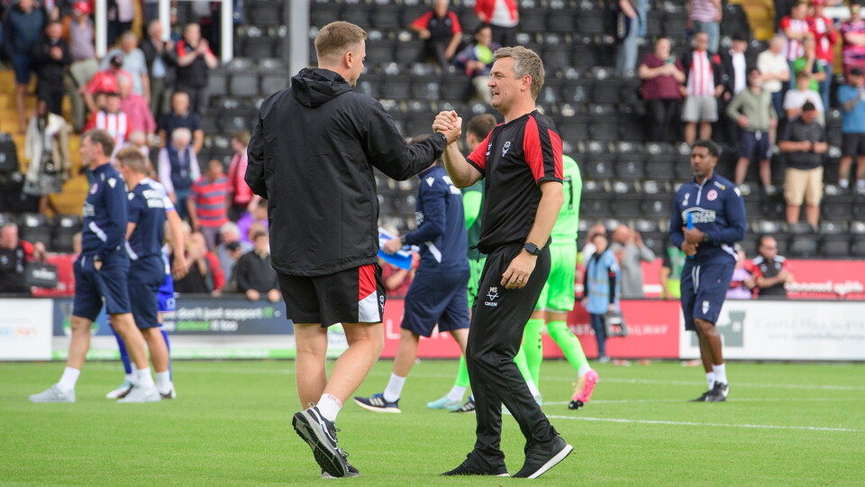 Tom Shaw, assistant head coach of Lincoln City, left, and Michael Skubala, head coach of Lincoln City following the EFL Sky Bet League One match between Lincoln City and Reading at LNER Stadium, Lincoln.