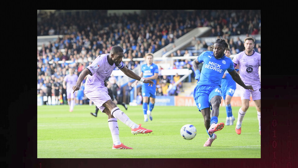 A match action image from City's game at Peterborough