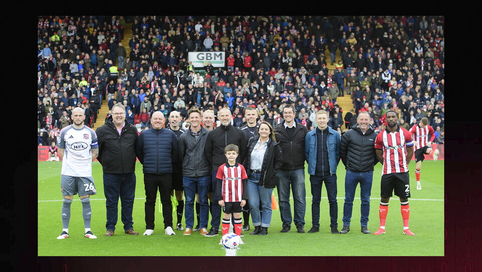 A matchday experience image from the Imps vs Exeter