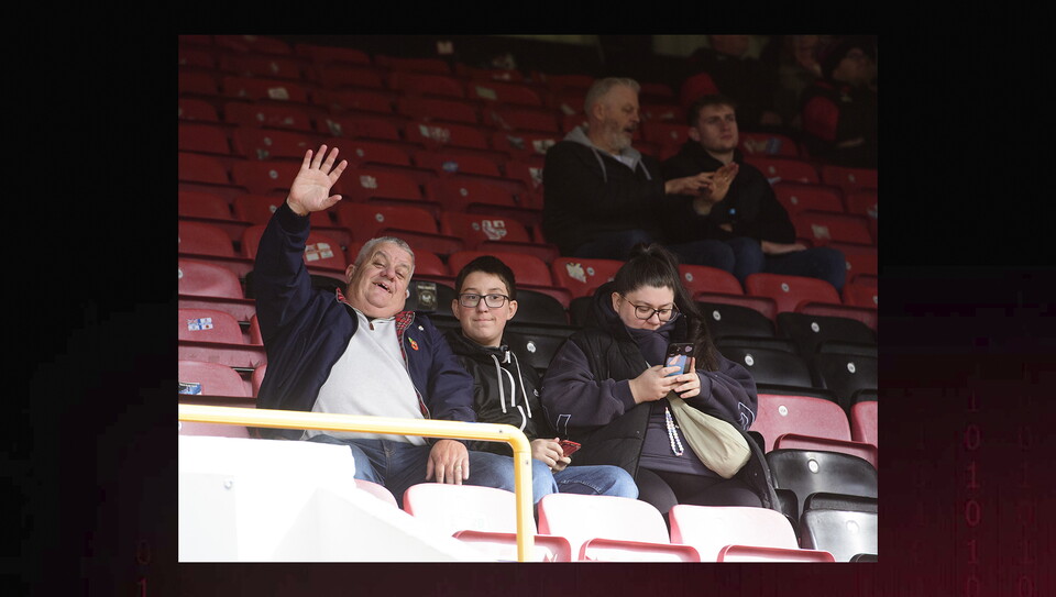 Fans watch Leyton Orient v Lincoln City