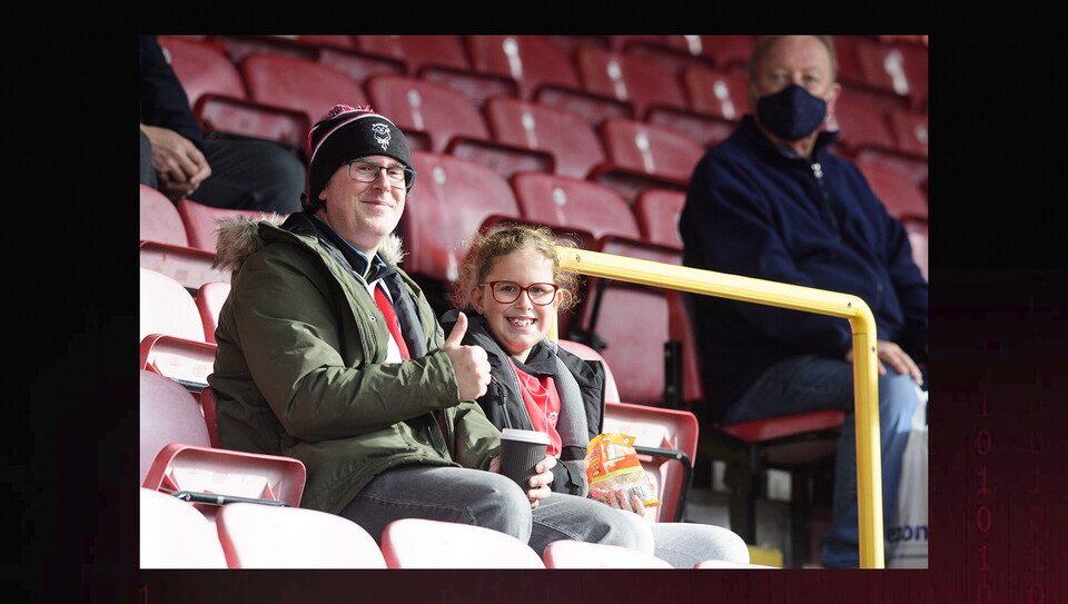 Fans watch Leyton Orient v Lincoln City