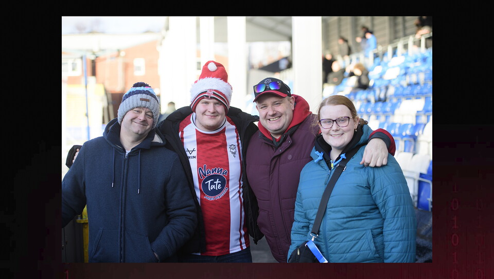 Lincoln City fans in the crowd at Stockport County on Boxing Day
