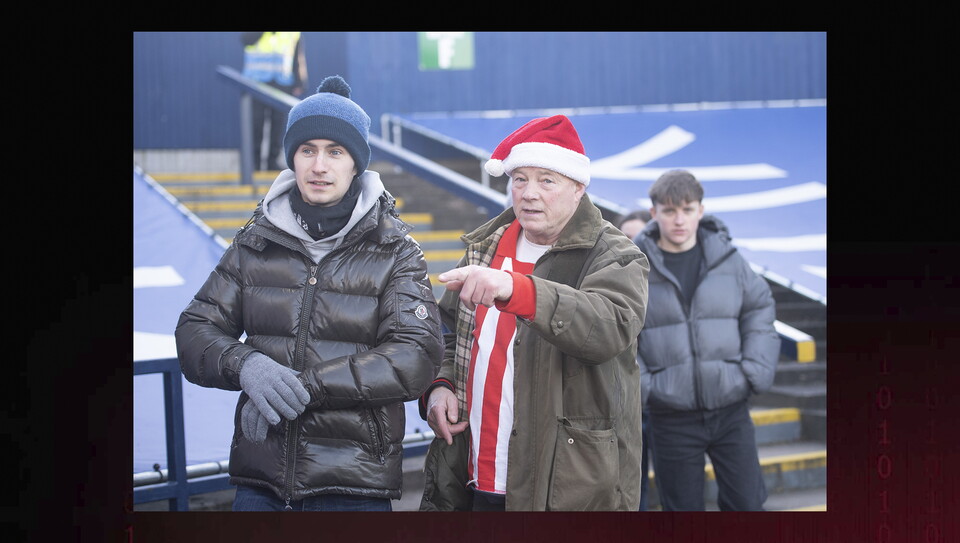 Lincoln City fans in the crowd at Stockport County on Boxing Day