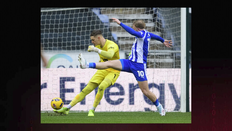 A match action photo from Wigan v Lincoln