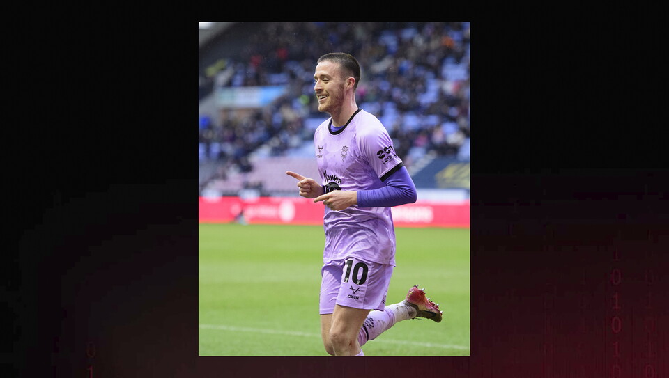 A match action photo from Wigan v Lincoln