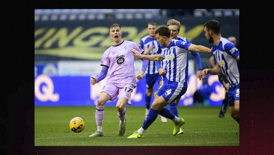 A match action photo from Wigan v Lincoln
