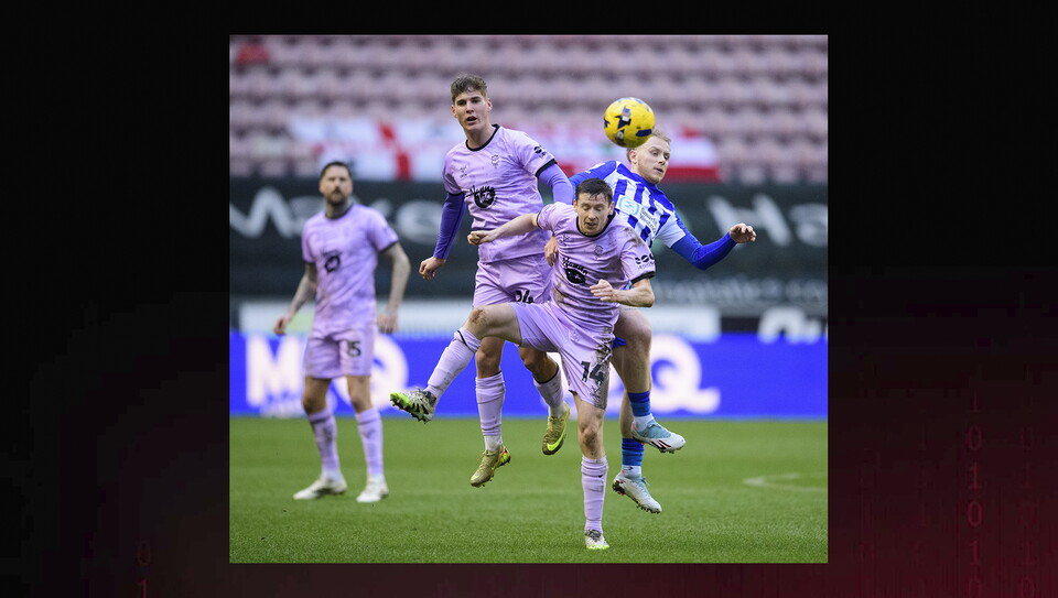 A match action photo from Wigan v Lincoln