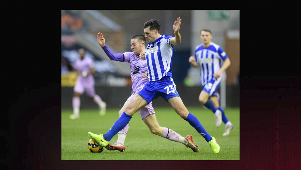 A match action photo from Wigan v Lincoln