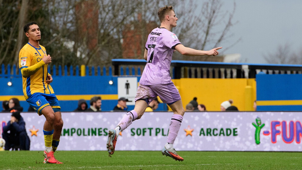 Rob Street celebrates scoring for Lincoln at Mansfield
