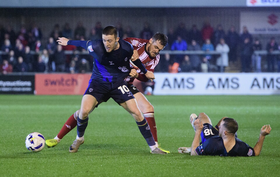 Jack Moylan tussles for the ball