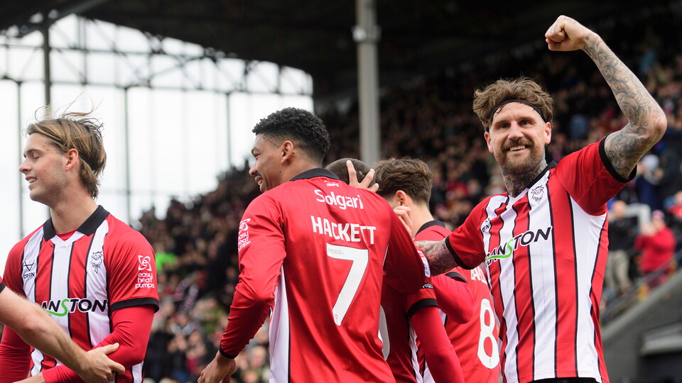 The Imps celebrate scoring against Leyton Orient