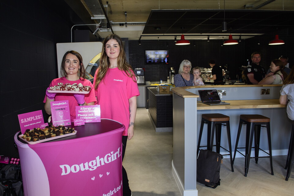 Doughgirl stand at the opening of the clubhouse