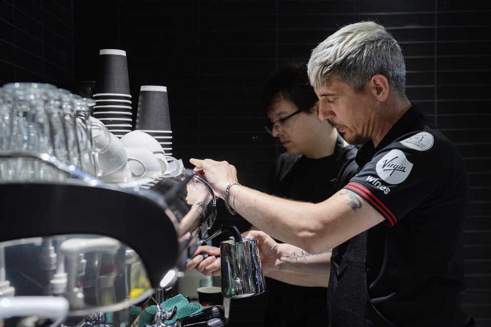 A man makes a coffee