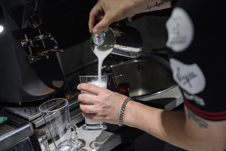 A man makes a coffee
