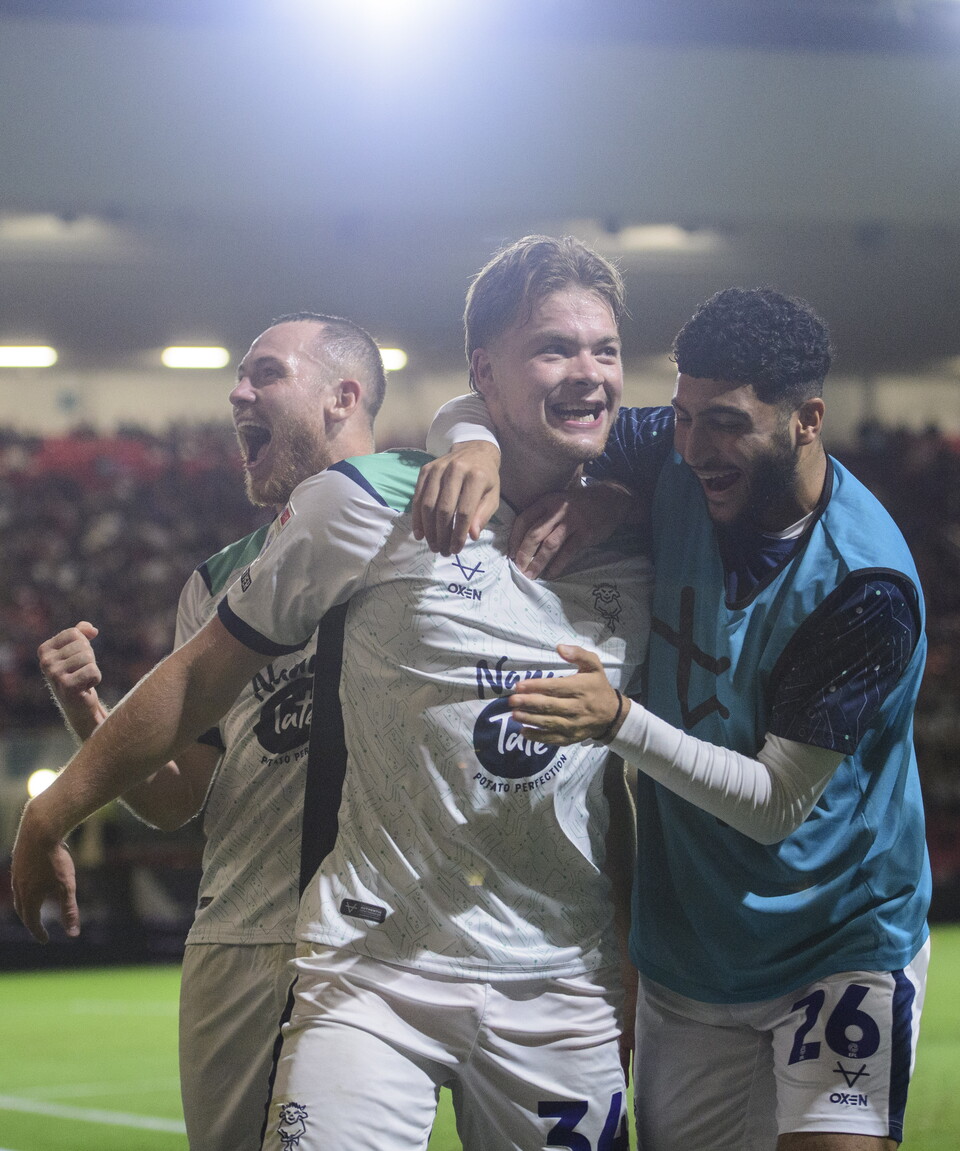 Freddie Draper is congratulated after scoring a goal