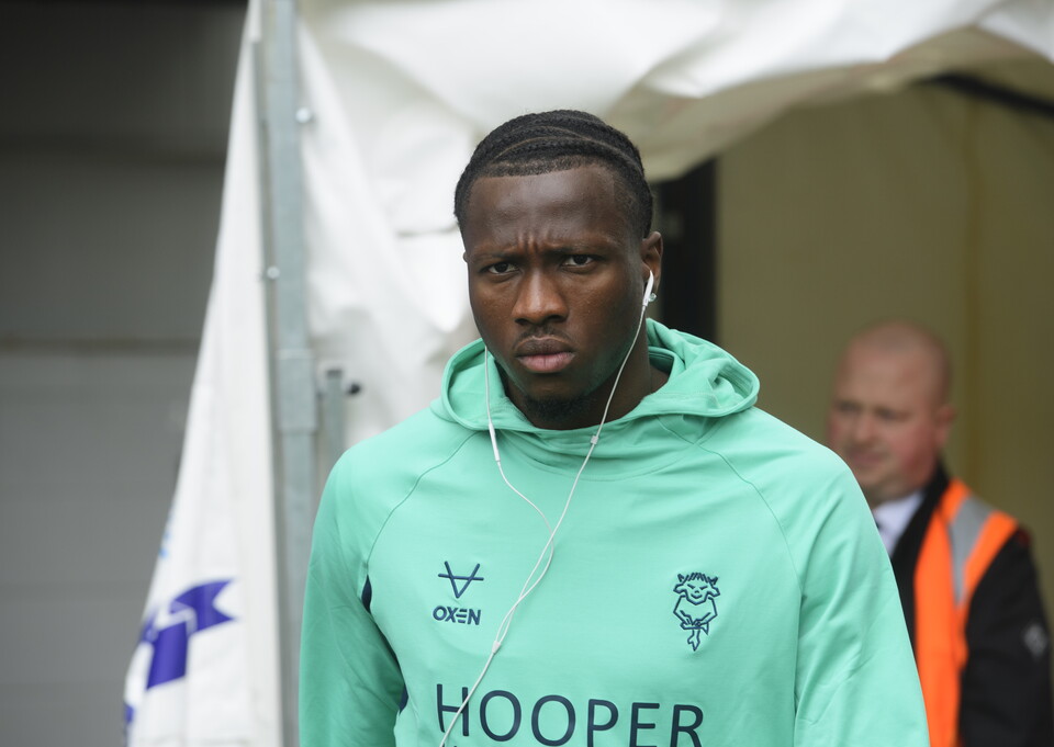 Daniel Oyegoke walks out of a tunnel.