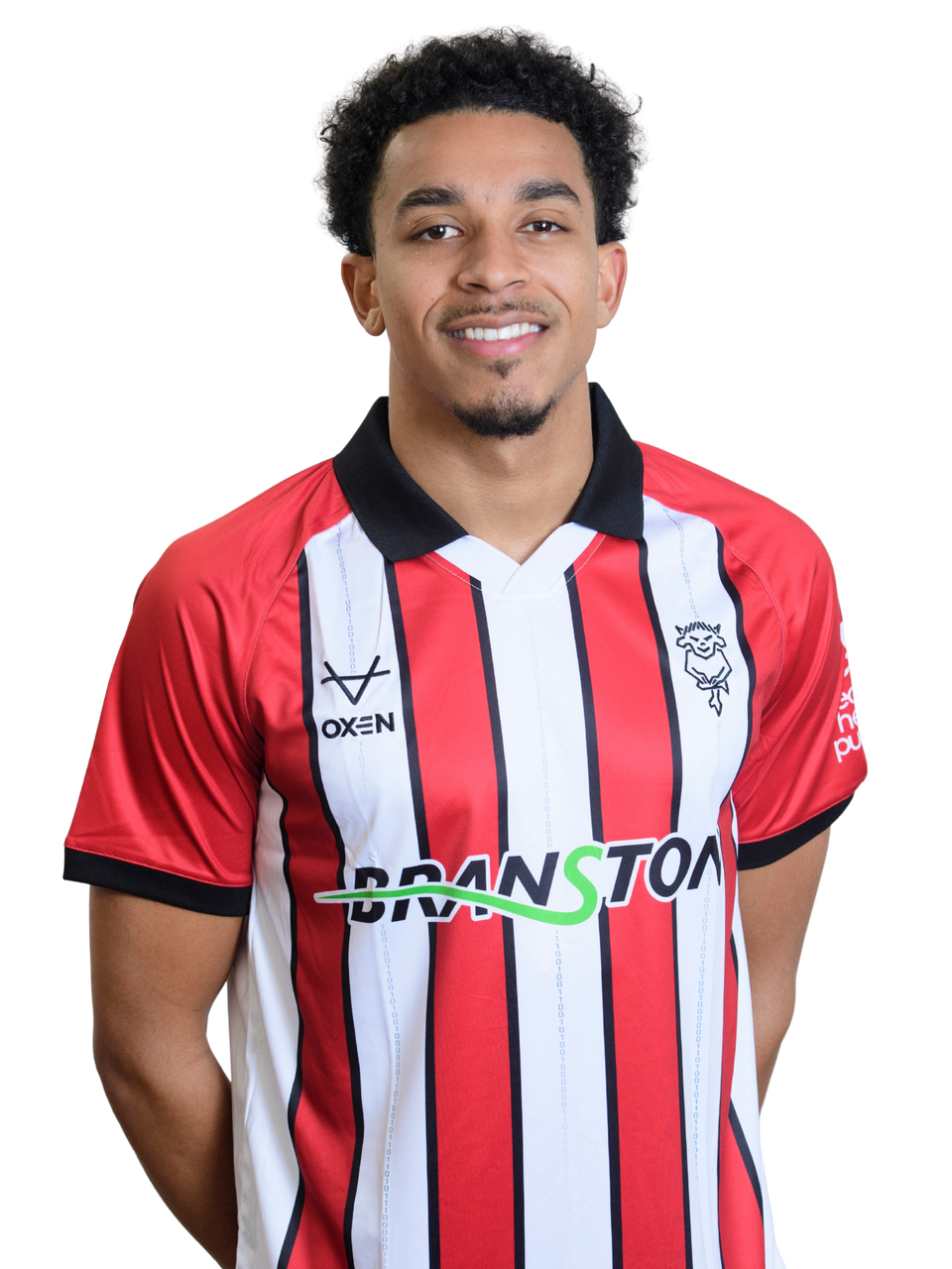 football player in lincoln city shirt