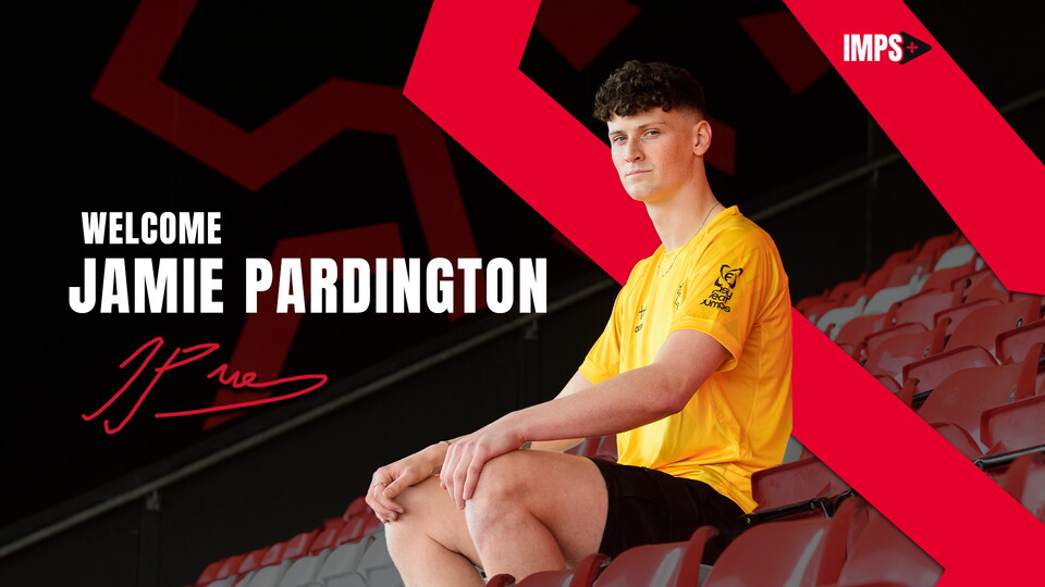 A graphic showing Jamie Pardington sat in a stand at the LNER Stadium. He is wearing a yellow goalkeeper shirt.