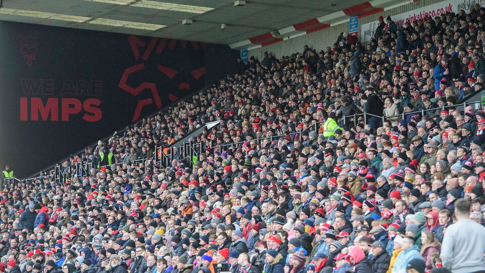 A photo of City supporters in the GBM Stand at the LNER Stadium.