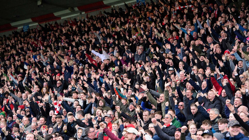 City supporters celebrate.
