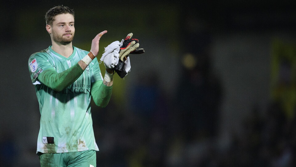 Lukas Jensen applauds supporters