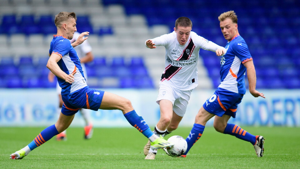 Jack Moylan in action against Oldham.