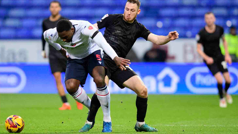 Ben House in action for Lincoln City at Bolton Wanderers