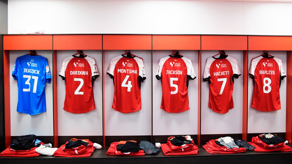 football shirts hung up