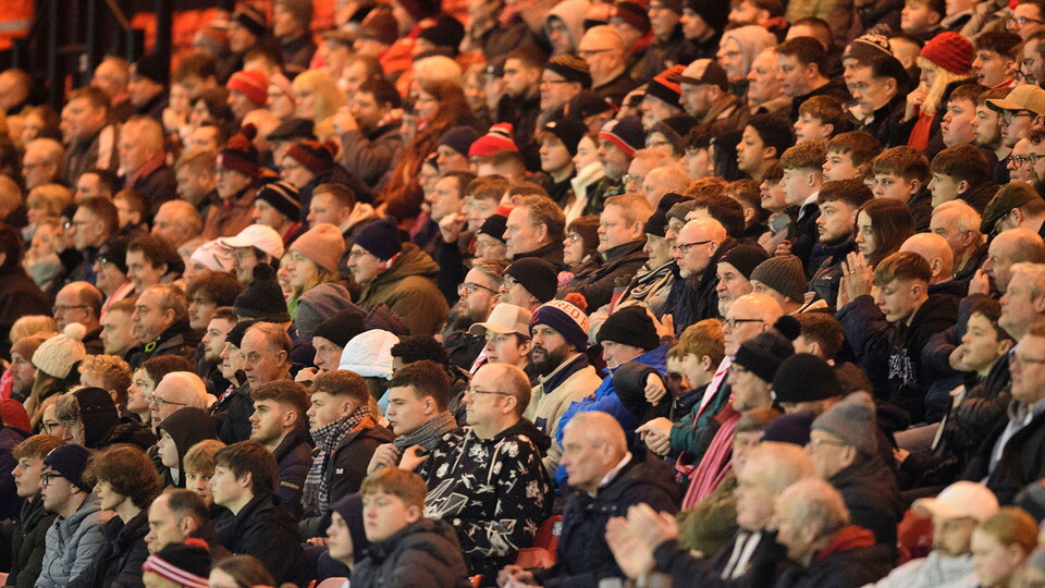 Fans in the GBM Stand at the LNER Stadium