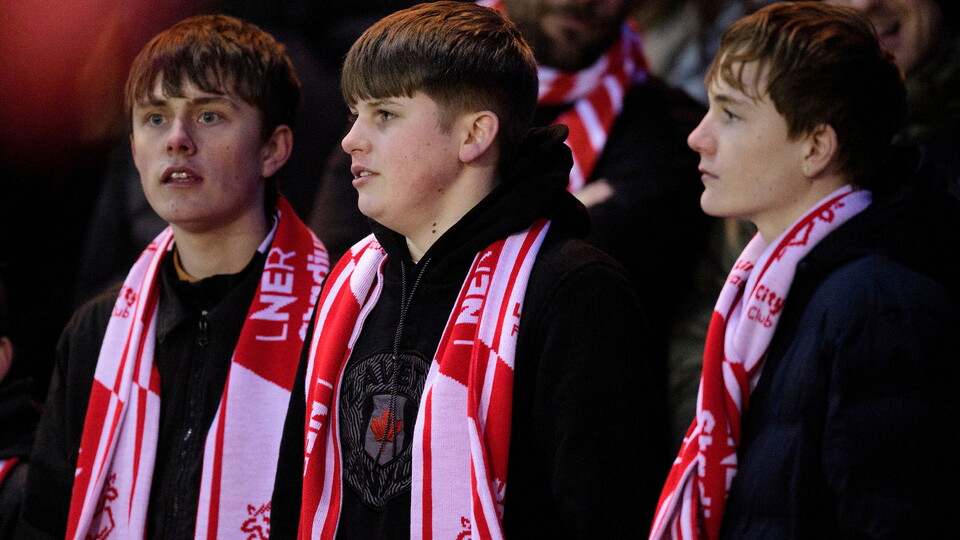 Fans in the GBM Stand of the LNER Stadium