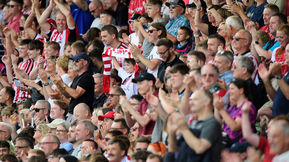 Fans in the GBM Stand of the LNER Stadium