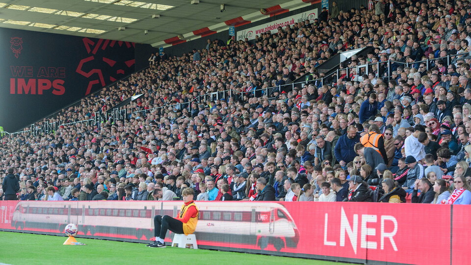 Supporters in the GBM Stand at the LNER Stadium