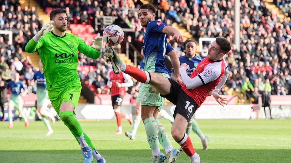 A match action image from City's home game against Burton Albion.