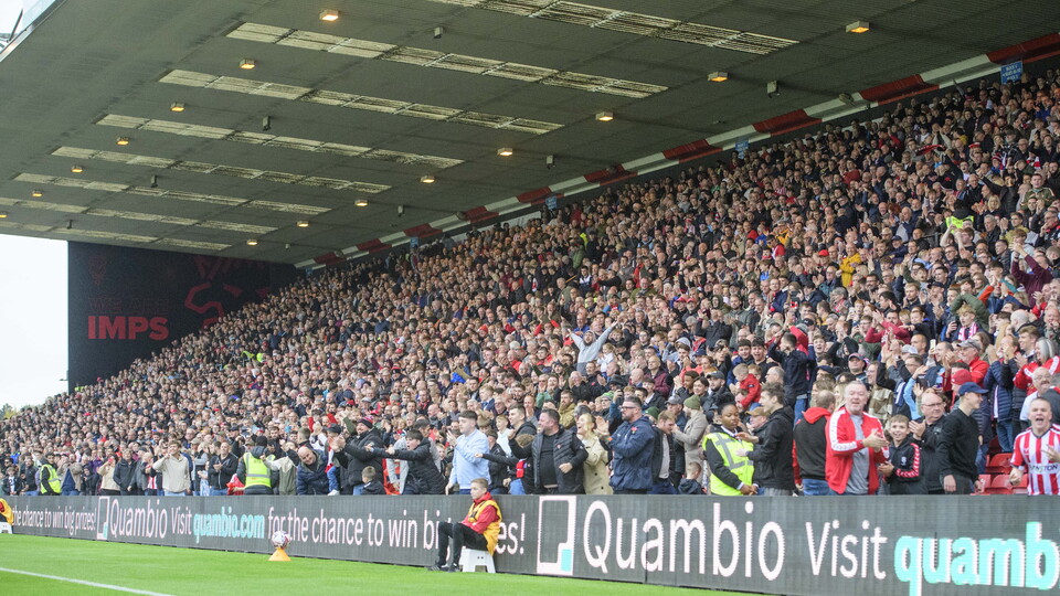 Lincoln City fans celebrate.