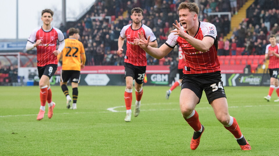 Freddie Draper celebrates scoring a goal.