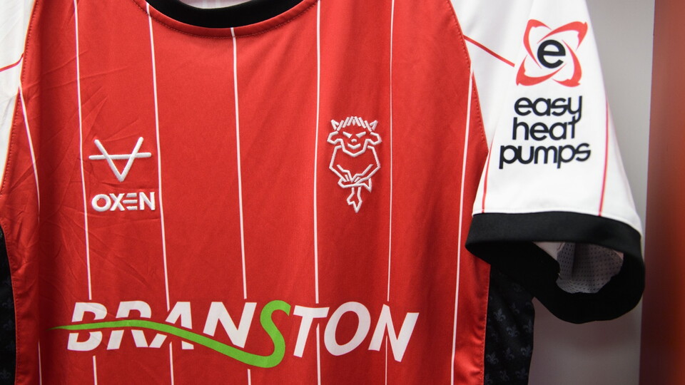 A photo of Lincoln City's home shirt. 