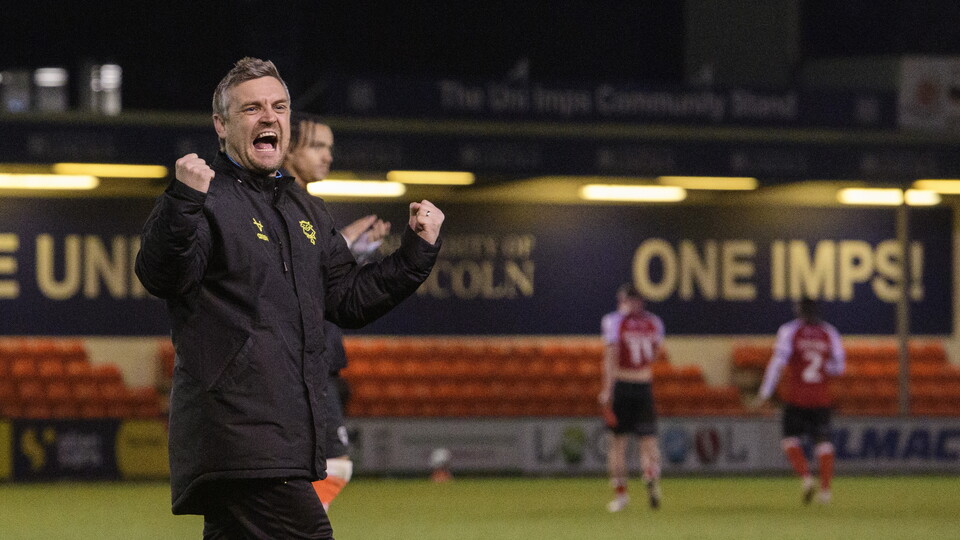 Michael Skubala celebrates Lincoln City's win