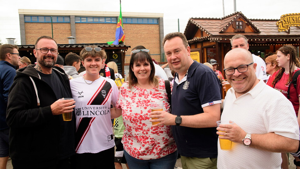 Lincoln City fans enjoying the pre-match atmosphere in the University of Lincoln Fan Village.