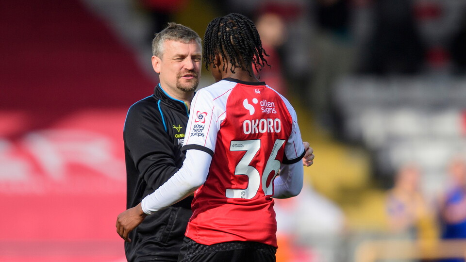 Michael Skubala, head coach of Lincoln City with Zane Okoro of Lincoln City following the EFL Sky Bet League One match between Lincoln City and Shrewsbury Town at LNER Stadium, Lincoln.