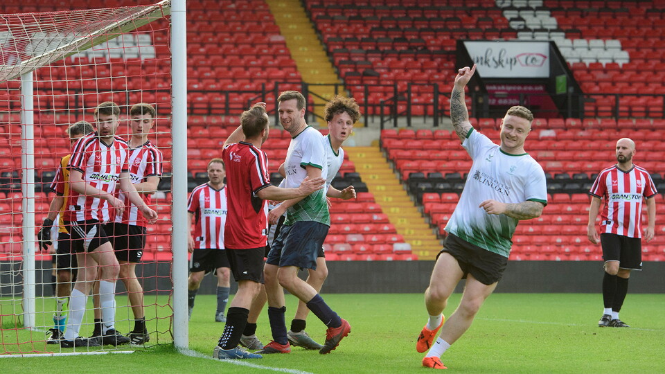 A player celebrates scoring during one of 2024's play on the pitch games