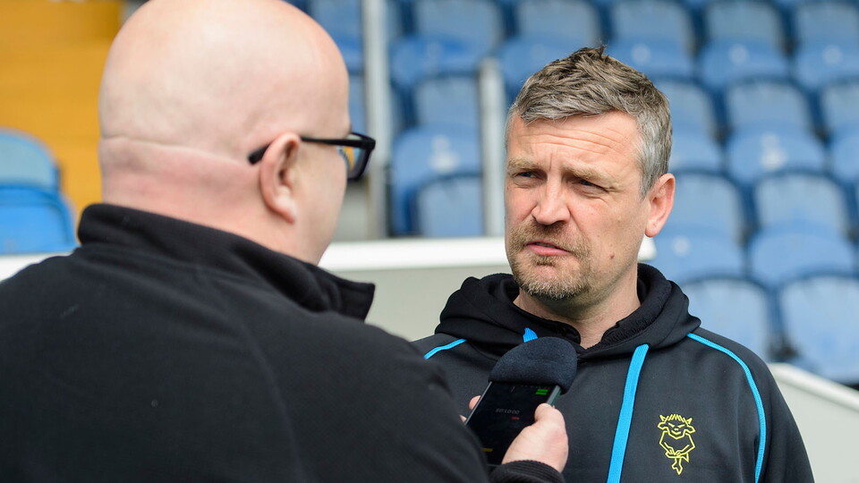 Michael Skubala speaking to BBC Radio Lincolnshire at the away game at Stockport County