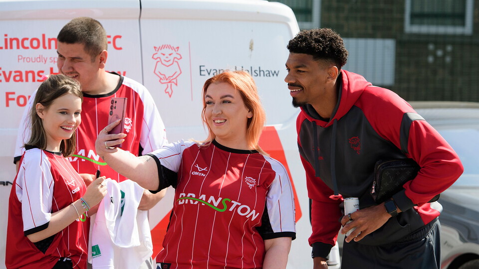 Reeco Hackett of Lincoln City arrives at the ground prior to the EFL Sky Bet League One match between Lincoln City and Shrewsbury Town at LNER Stadium, Lincoln.