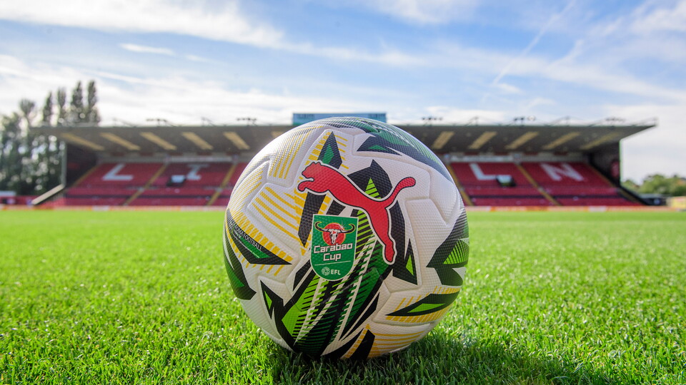 A Carabao Cup ball on the pitch at the LNER Stadium. 