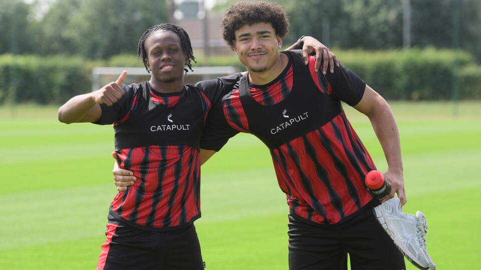 Zane Okoro and Jovon Makama pose for a photo together. Zane is giving a thumbs up.