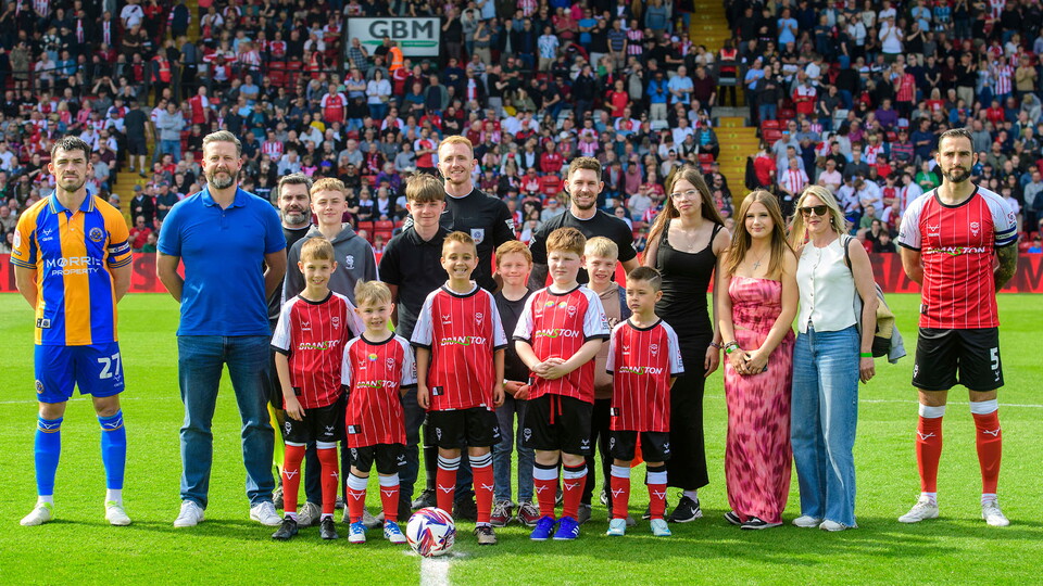 The mascots line up before City's home game against Shrewsbury Town