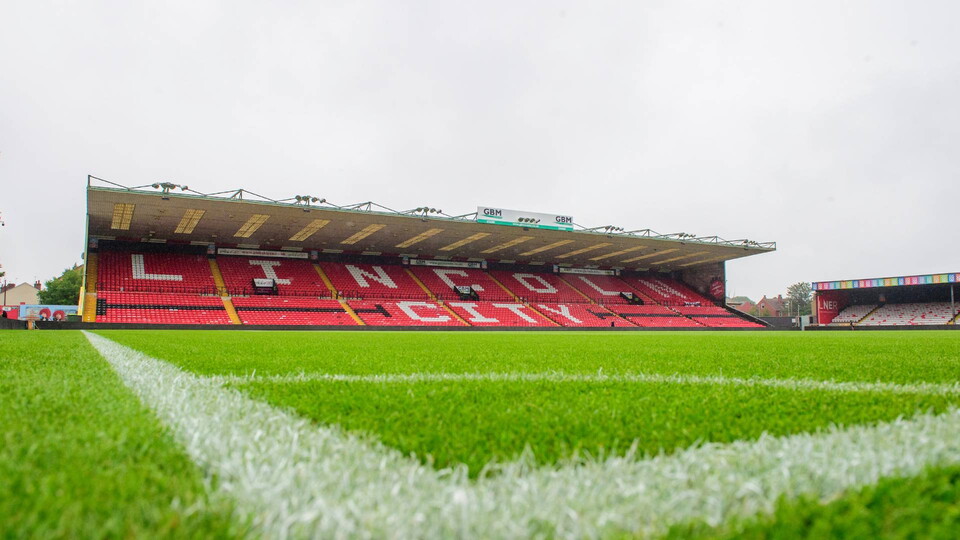 A general view of LNER Stadium, home of Lincoln City, showing the GBM Stand during the pre-season friendly match between Lincoln City and West Bromwich Albion at LNER Stadium, Lincoln.