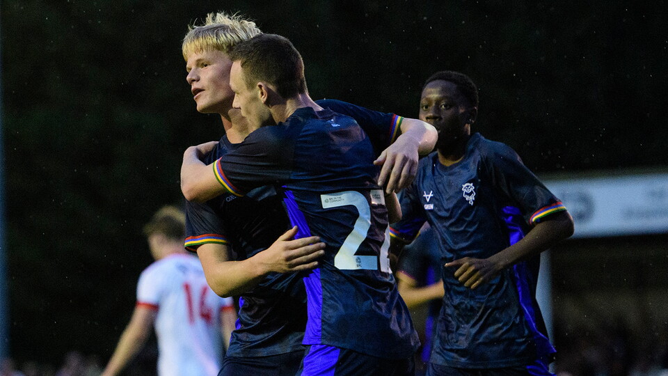 City celebrate their equaliser against Lincoln United